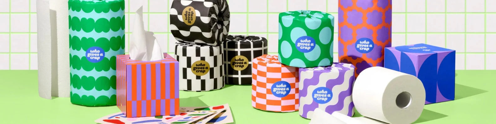 Who Gives A Crap eco-friendly bamboo toilet paper rolls displayed in colourful packaging at Glen Ogal