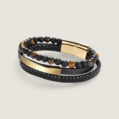 Multi-Layer black leather and beaded bracelets with gold accessories for Men.